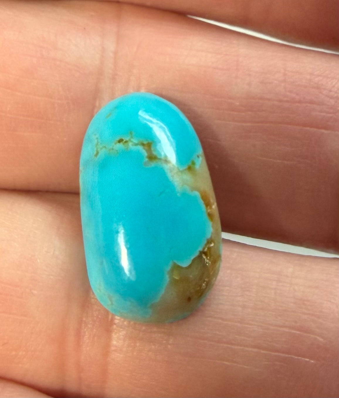 Nacozari turquoise cabochon NA-003 in hand