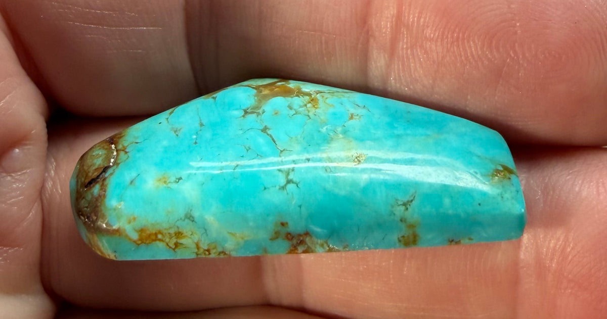 Tyrone turquoise cabochon TY-012 alternate in-hand view